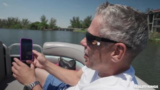 Jade Green gets her pussy fingered by Mick Blue on his boat