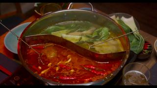At the hotpot, Zoé and Jonas get excited by the chilies