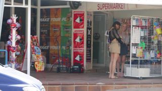 Two exhibitionist friends stroll naked on the street and at the beach