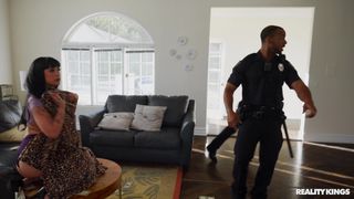 Becca Barbie gives a treat to the officer Mazee the Goat!